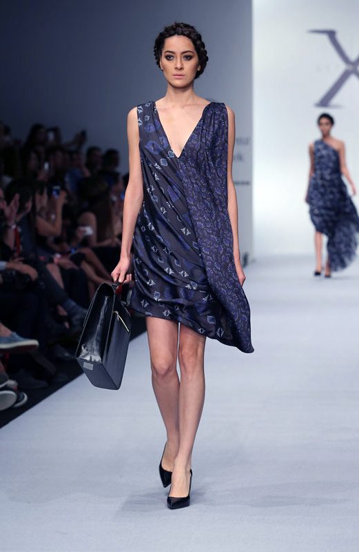 MEXICO CITY, MEXICO - OCTOBER 02:  A model walks the runway during Centurion show at Mercedes-Benz Fashion Week México Spring/Summer 2015 at Campo Marte on October 2, 2014 in Mexico City, Mexico.  (Photo by Victor Chavez/Getty Images)
